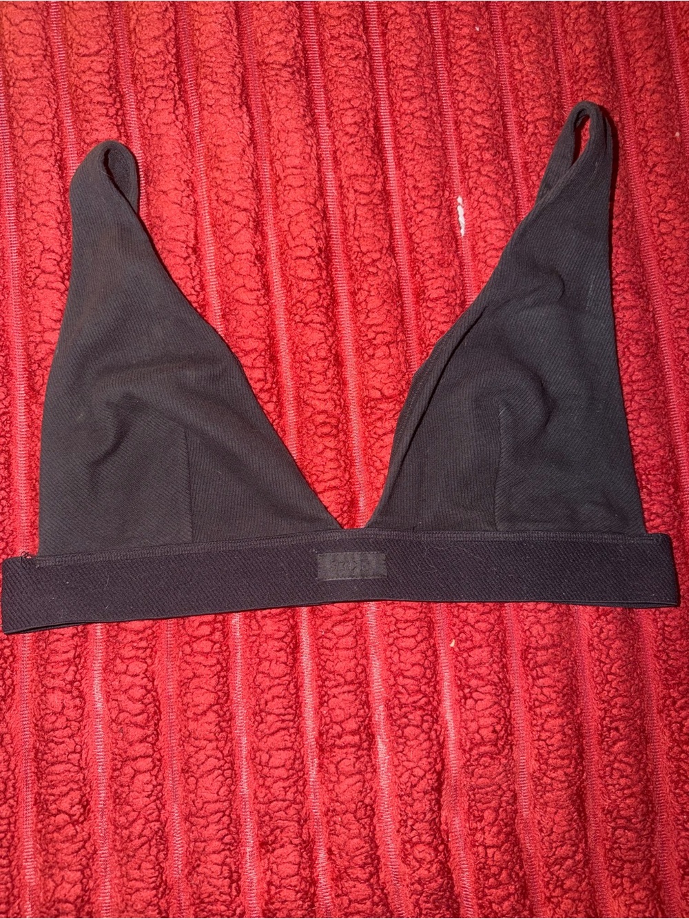 SKIMS Black Wireless Triangle Bralette - Seamless Ribbed Design